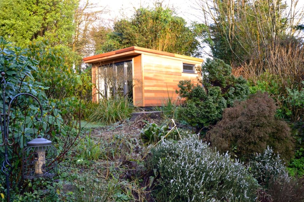 Cedar cladding was used due to its ability to tolerate the wet environment of this wooded area