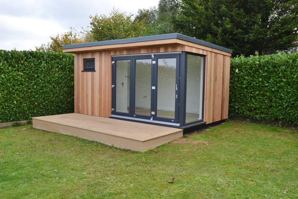 A garden office for one. Exterior view showing the anthracite grey UPVC bi-folding doors