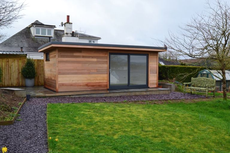 This large garden room is clad with Western red cedar cladding