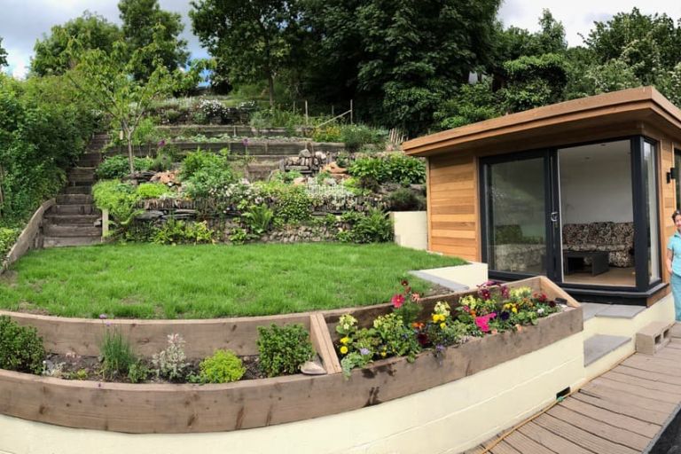 The finished room set within the landscaped garden