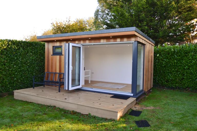 The bi-fold doors open onto a composite decking