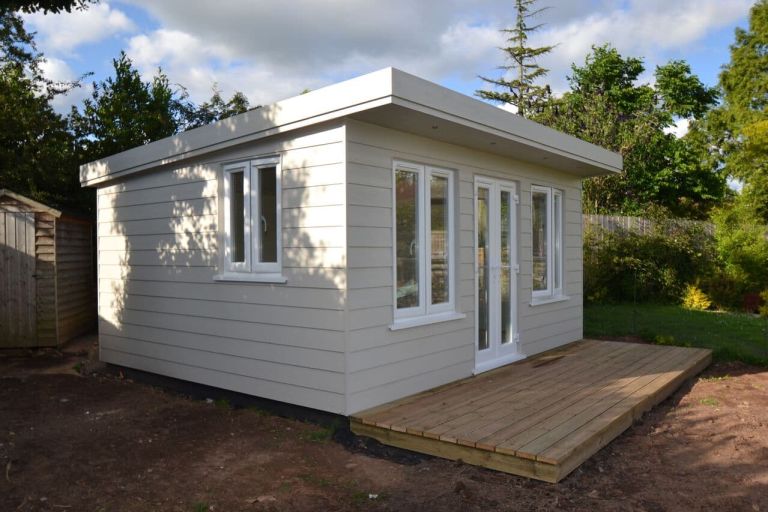 Garden room to be used as a treatment room. James Hardie cement particle cladding board with matching soffits, fascia, and corner trims