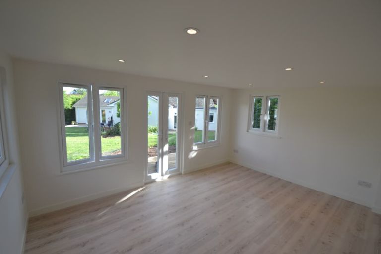 The treatment room interior is plastered and decorated and has laminate flooring