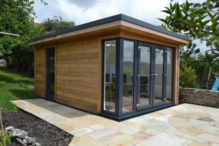 This garden room, to be used as a writer's retreat, also has an attached storeroom